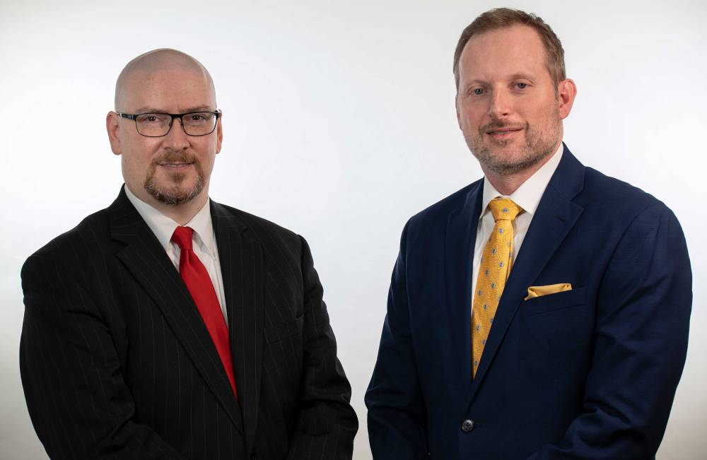 Photo of attorneys Charles Messina and Christopher D. Smith